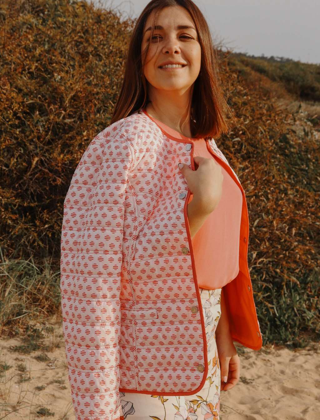 Parka acolchoada curta reversível